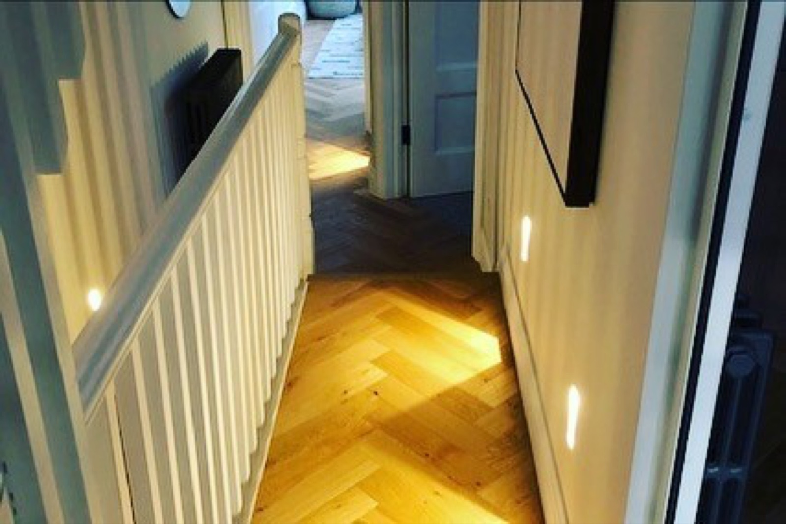 Prestigious London apartment in Balham - herringbone parquet hallway following bespoke second fix electrical install